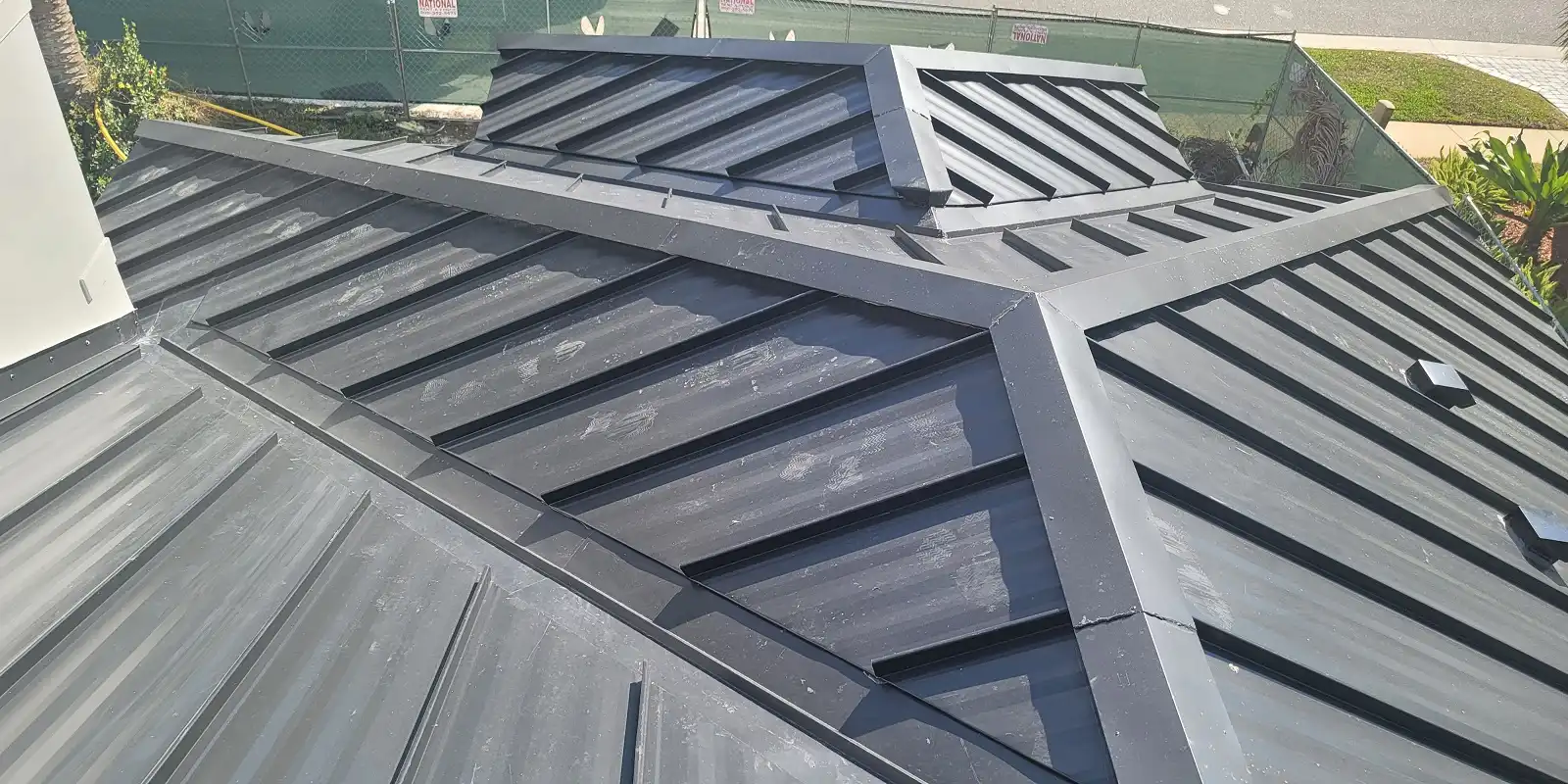 Before and after metal roof transformation Fort Lauderdale