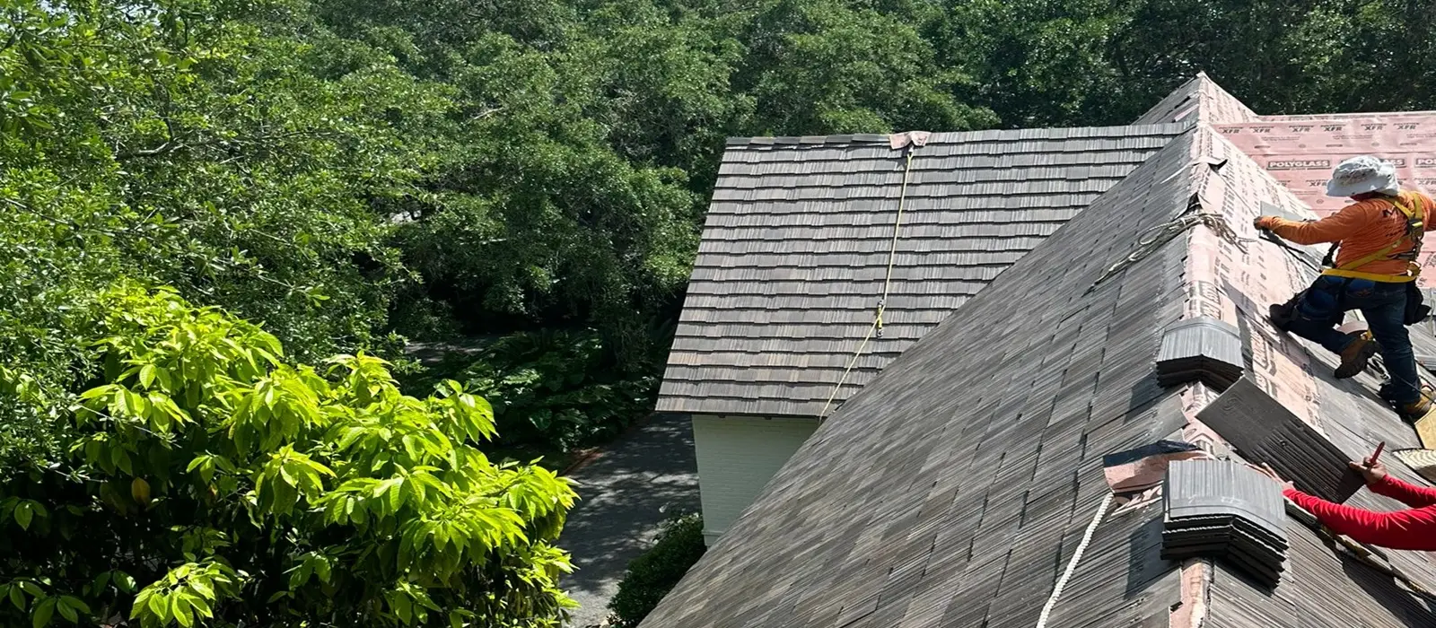 Finished DaVinci synthetic composite shake roof in progress showing natural wood colors