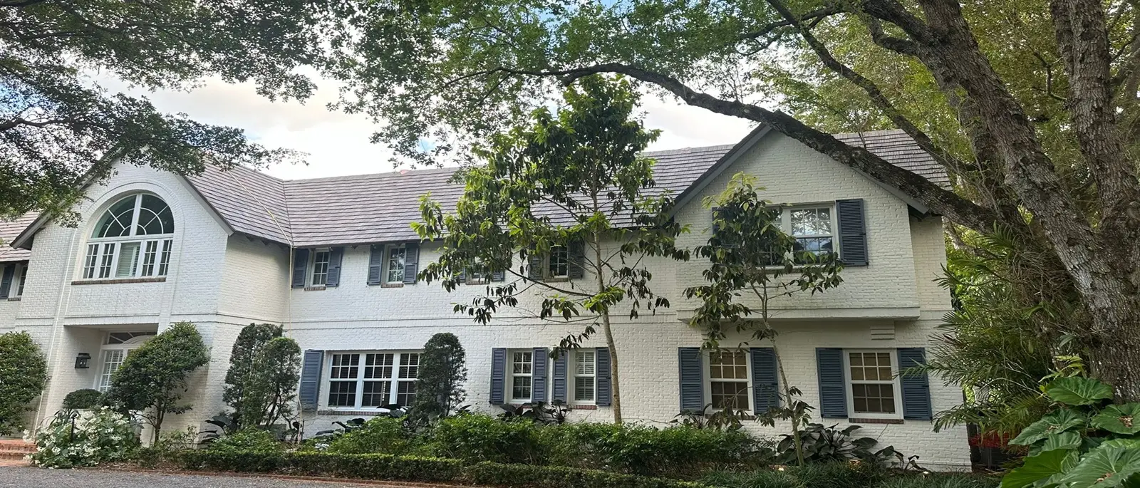 Luxury home with a finished synthetic slate composite roof