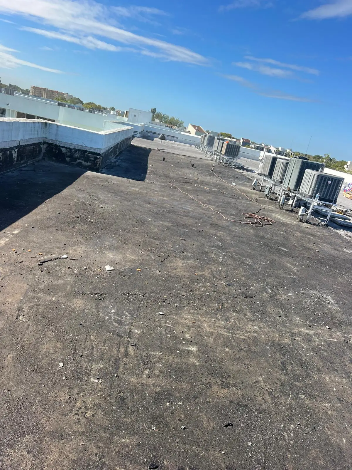 Planet Roofing professional commercial flat roof installation in West Palm Beach FL