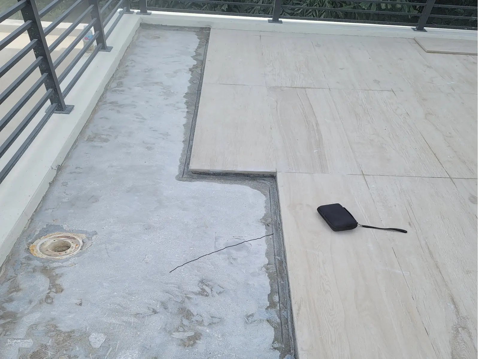 Finished waterproofed concrete balcony patio showing clean seamless surface in South Florida
