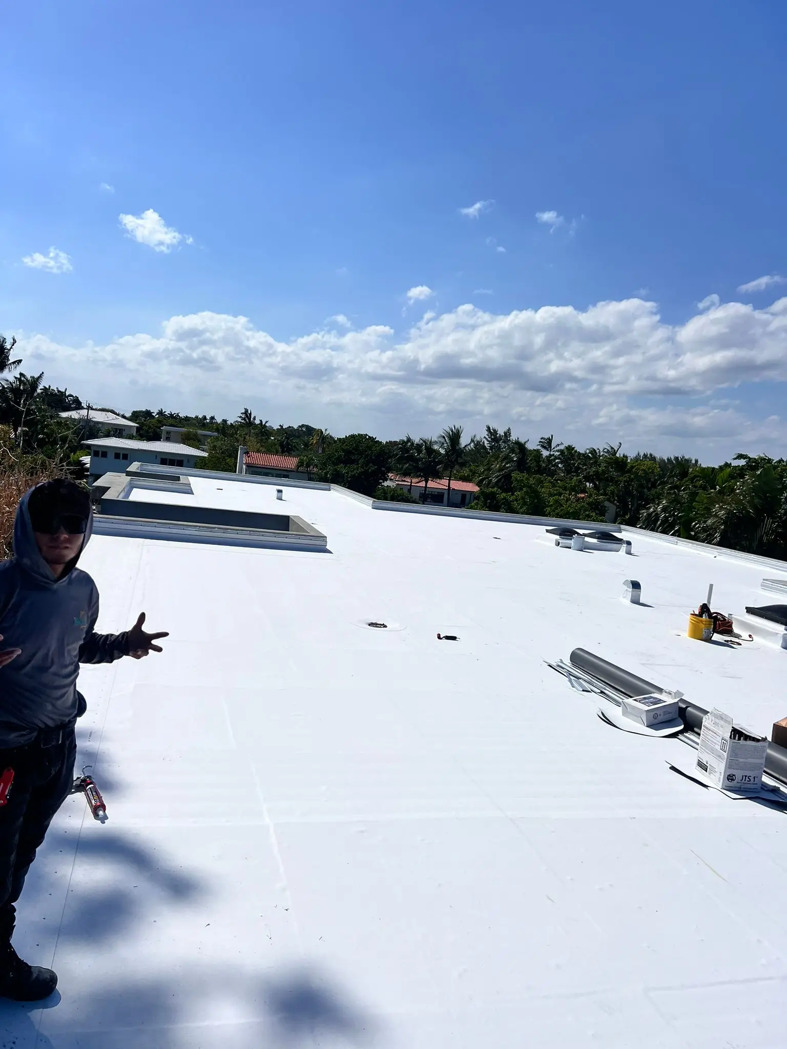 Planet Roofing professional tapered TPO insulation installation in Miami Beach FL
