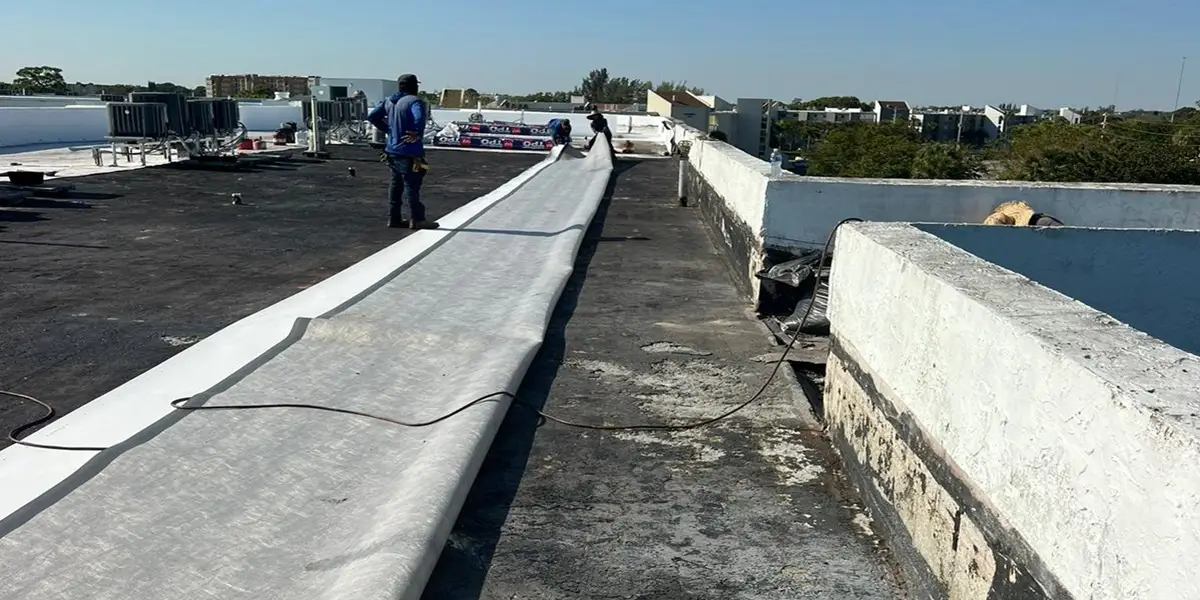 Planet Roofing professional commercial TPO flat roof installation in Lake Worth Beach FL