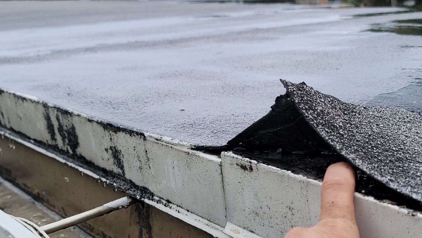 FLAT ROOF EDGE DAMAGE