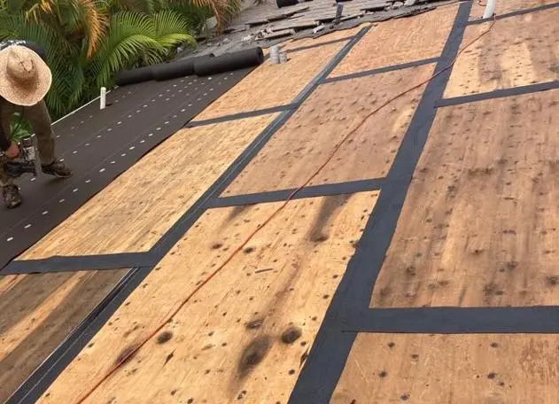 Self-adhered 4-inch strips applied at all plywood joints for enhanced roof waterproofing.