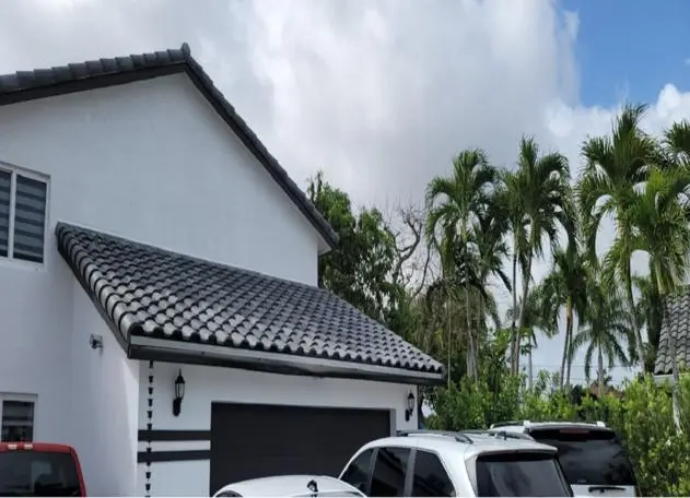 Visible roof flashing on a tile roofing project for waterproofing and protection.