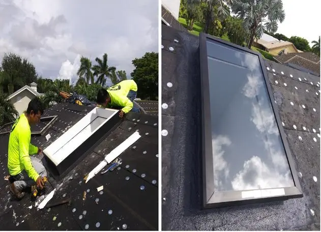 Installation of a skylight in progress on a roof, with workers and tools visible.