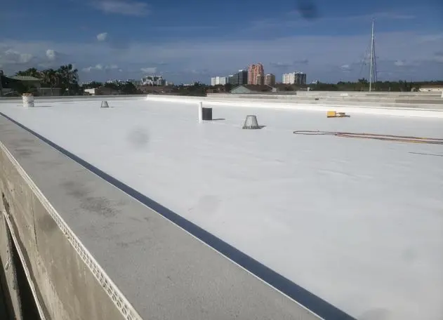 TPO membrane installation for waterproofing on a commercial building roof.