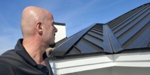 Planet Roofing man ready for metal roof repair or replace in Broward County