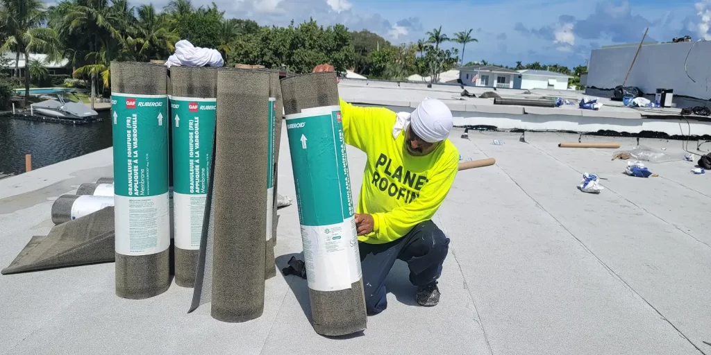 Licensed roofer repairing a leaky roof in Fort Lauderdale, Florida