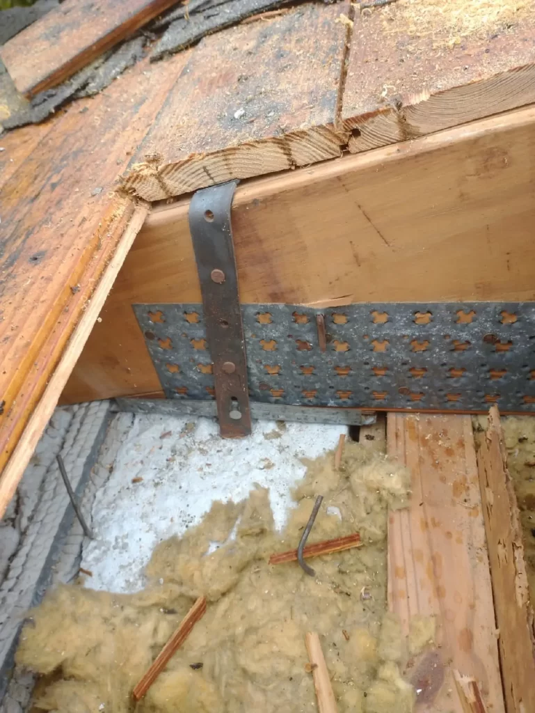 Fort Lauderdale home receiving hurricane mitigation retrofit on hip roof