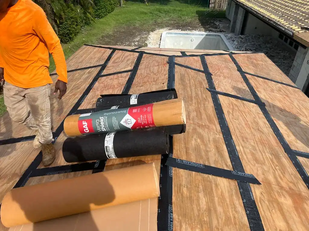 Underlayment and flashing installation on roof deck in Broward County