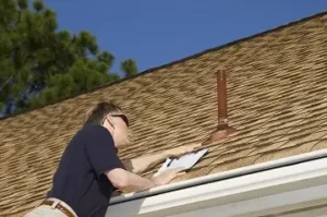 Roof Contracrtor inspecting roof in Fort Lauderdale