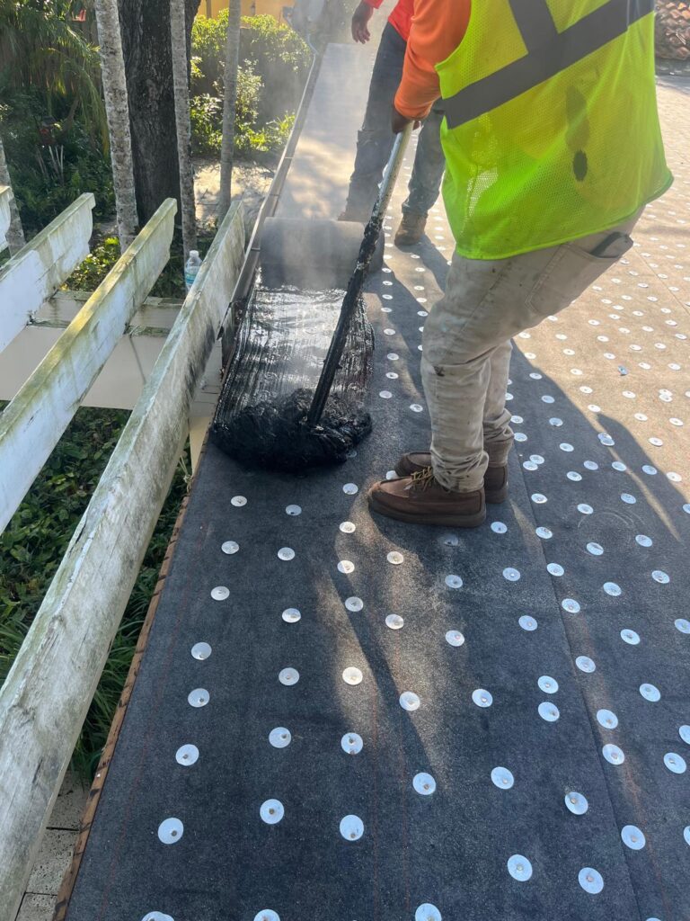 Flat roof replacement in a gated community in Boca Raton