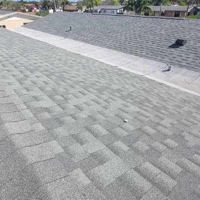 Shingle roofing and valley in the middle