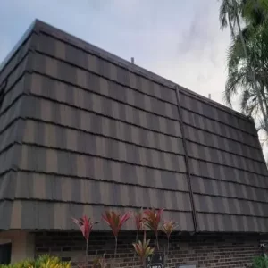 A close-up view of a stone-coated metal roof showing texture and weather resistance