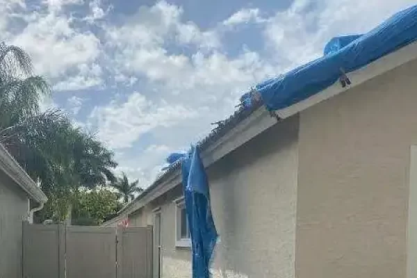 Tarp Falling from a roof